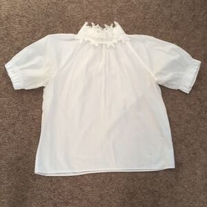 White Lace Neck shirt.